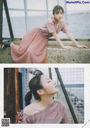 A woman in a pink dress is walking down the street.